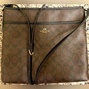 Original Coach messenger bag. Crossbody strap. Good condition. Brown/black color